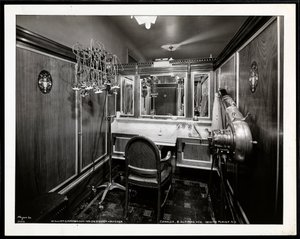 Interior view of a hairdressing booth at the Charles of the Ritz beauty salon at B. Altman und Co. by Byron Company